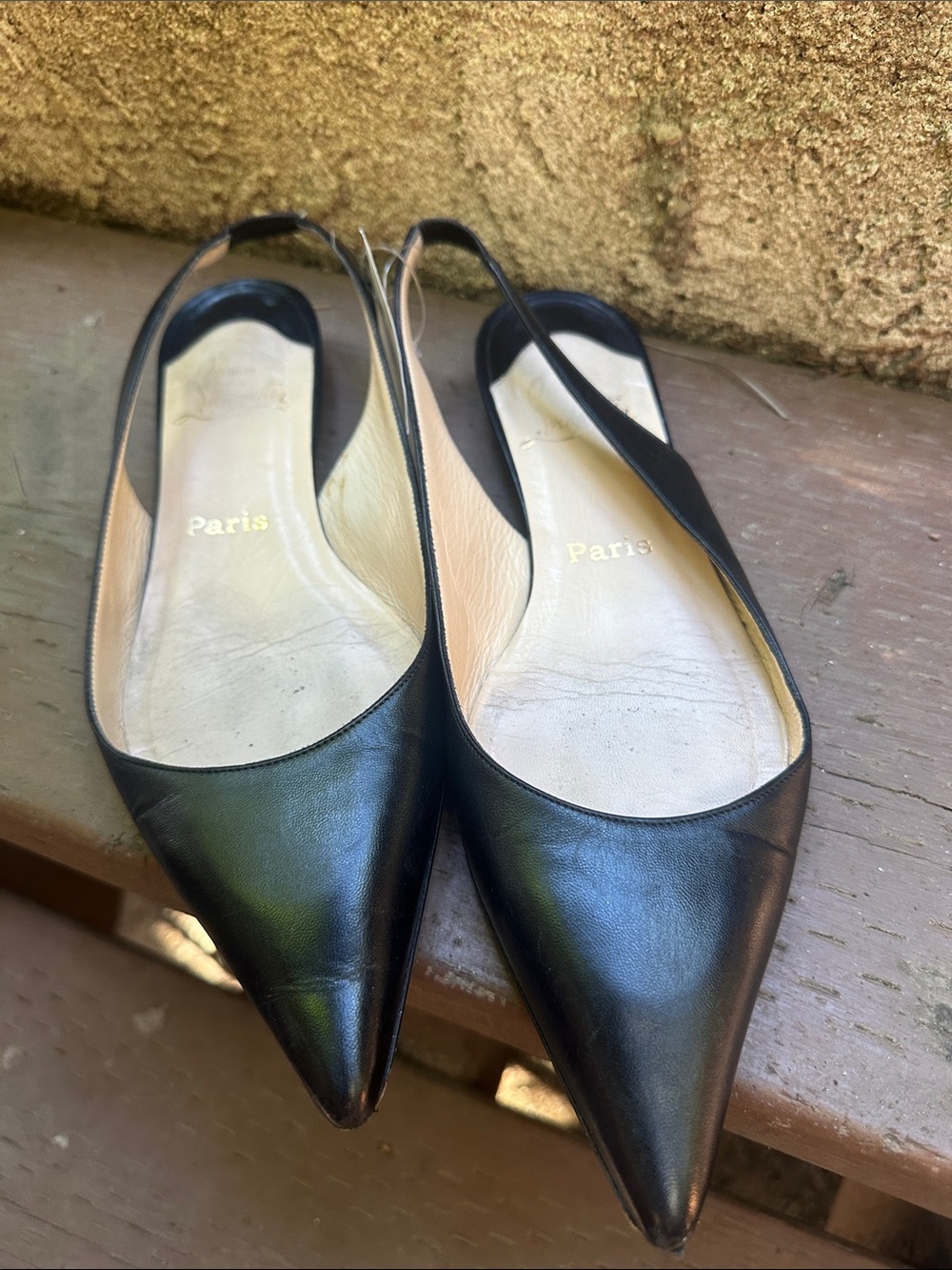 Christian Louboutin Slingback flats Featuring a sharp Pointed Toe